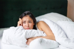 sad-and-gloomy-asian-girl-lying-in-her-bed-grimac-2023-11-27-05-07-12-utc-768x512